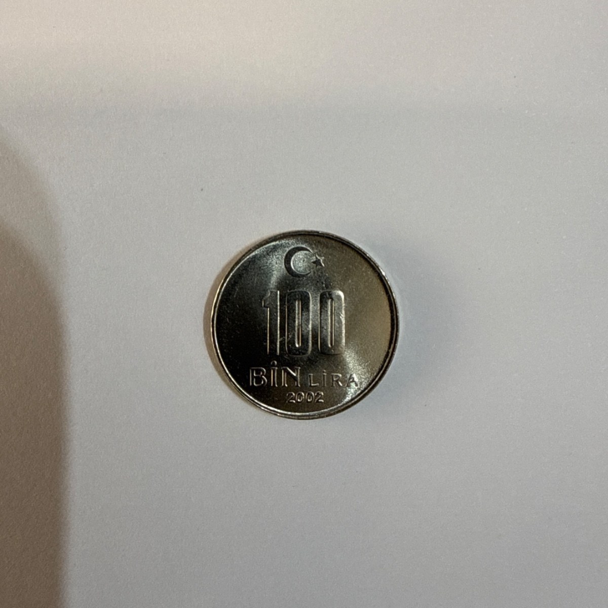 Anverso de 100.000 Liras, 2002