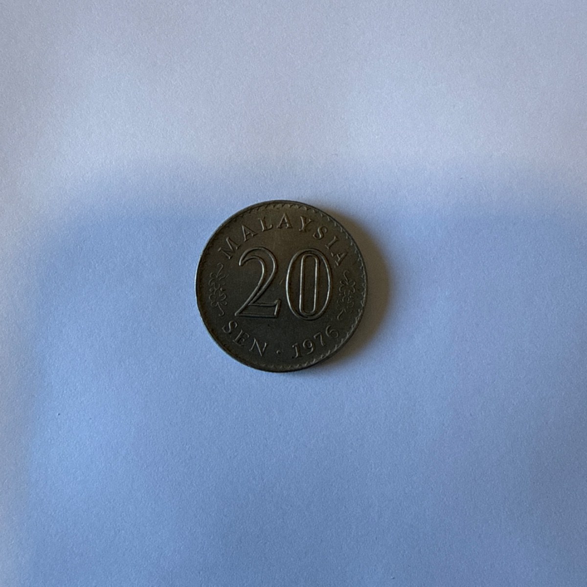 Anverso de 20 Sen, 1976